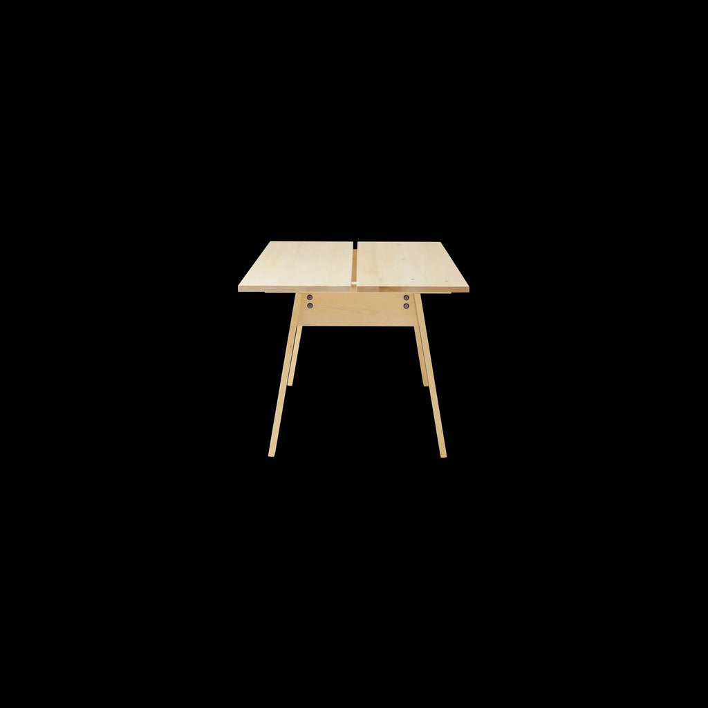 Ishinomaki Laboratory Os Table โต๊ะไม้โครงสร้าง A-frame พร้อมร่องกลางสำหรับสายไฟ ออกแบบโดย Paul Vaugoyeau