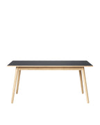 FDB Møbler C35 Dining Table Series โต๊ะไม้โอ๊กดีไซน์ปี 1957 โดย Poul M. Volther พร้อมตัวเลือกท็อปไม้โอ๊กและลิเนเลียม หลายขนาดและแผ่นต่อโต๊ะ (extension leaves)