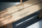 Ishinomaki Laboratory 90° Bench ม้านั่งไม้ที่นั่งถัก papercord ออกแบบโดย Norm Architects