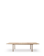 Nikari Basic Extendable Straight Table โต๊ะต่อขยาย ash หรือ oak พร้อมแผ่นต่อสองชิ้นที่เก็บไว้ภายในตัวโต๊ะ ออกแบบโดย Jenni Roininen