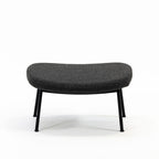 Case Furniture Ella Ottoman สตูลพักเท้าทรงโมเดิร์น หุ้มผ้า Bouclé เนื้อนุ่ม พร้อมฐานให้เลือก 4 แบบ ทั้งเหล็กดำ สเตนเลส ไม้โอ๊ค และไม้วัลนัต ออกแบบโดย Matthew Hilton ใช้คู่กับ Ella Lounge Chair