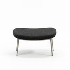 Case Furniture Ella Ottoman สตูลพักเท้าทรงโมเดิร์น หุ้มผ้า Bouclé เนื้อนุ่ม พร้อมฐานให้เลือก 4 แบบ ทั้งเหล็กดำ สเตนเลส ไม้โอ๊ค และไม้วัลนัต ออกแบบโดย Matthew Hilton ใช้คู่กับ Ella Lounge Chair