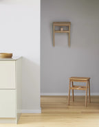 Angle Foldable Stool สตูลพับได้ไม้โอ๊คดีไซน์มินิมอล สามารถแขวนผนังได้ ออกแบบโดย Jonas Herman