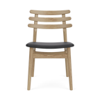 J48 Chair โดย Poul M. Volther (1951) จาก FDB Møbler ดีไซน์เรียบง่ายตามแนวฟังก์ชันนัลลิสม์เดนมาร์ก โครงไม้โอ๊คแข็งแรง พนักพิงโค้งเอกลักษณ์ รองรับสรีระได้ดี เหมาะใช้เป็นเก้าอี้ทานอาหารหรืออเนกประสงค์ภายในบ้าน