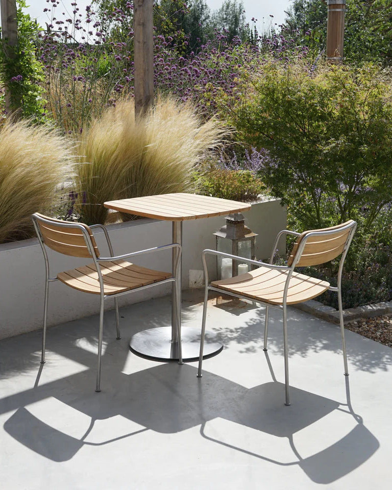 Solas Armchair เก้าอี้กลางแจ้งไม้สักโครงสแตนเลส ออกแบบโดย Matthew Hilton