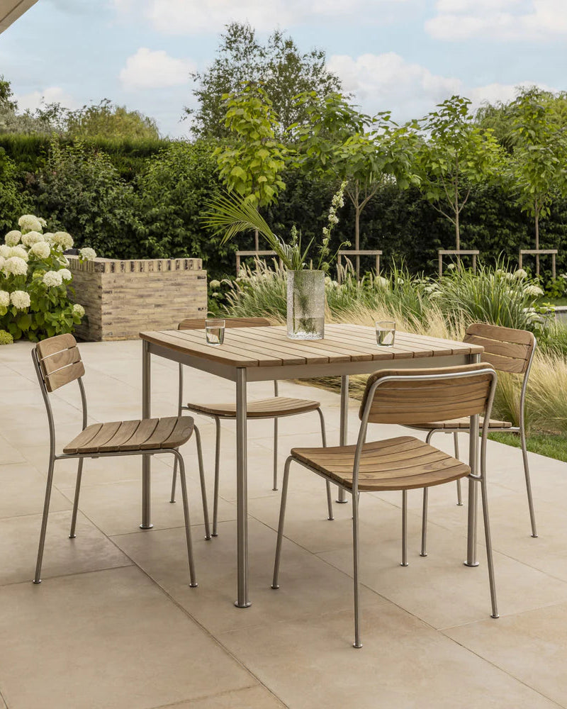 Solas Square Table โต๊ะกลางแจ้งหน้าไม้สักโครงสแตนเลส ออกแบบโดย Matthew Hilton