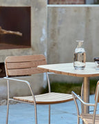 Solas Armchair เก้าอี้กลางแจ้งไม้สักโครงสแตนเลส ออกแบบโดย Matthew Hilton