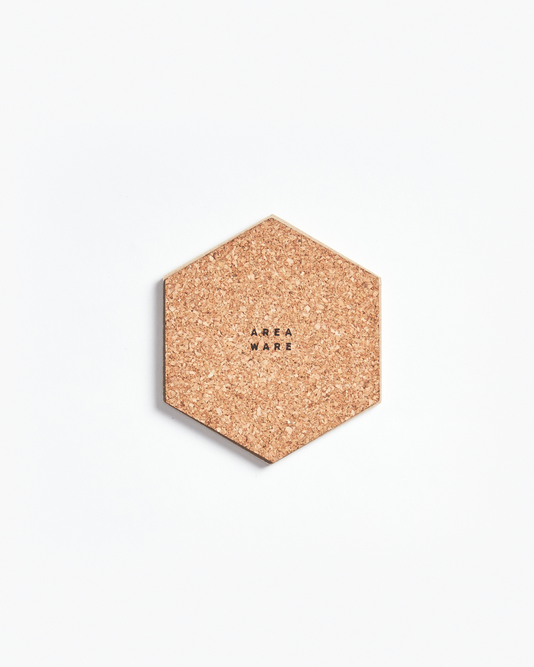 Areaware Table Tiles by Bower Studios, geometric beech-and-cork coasters that form playful 3D mosaics, curated by Old Pine Trees. เซ็ตจานรองแก้วไม้และคอร์กจาก Areaware ผลงานของ Bower Studios จัดวางต่อกันได้เป็นลวดลายสามมิติ คัดสรรโดย Old Pine Trees
