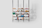 Very Good & Proper Croquet Compression Shelving ชั้นวางของแบบ floor-to-ceiling โครงไม้ oak และเหล็ก modular ออกแบบโดย Michael Marriott