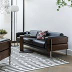 Forum 3-Seater Sofa โซฟาไม้ดีไซน์ mid-century พร้อมโครงไม้เปิดด้านนอก ออกแบบโดย Robin Day
