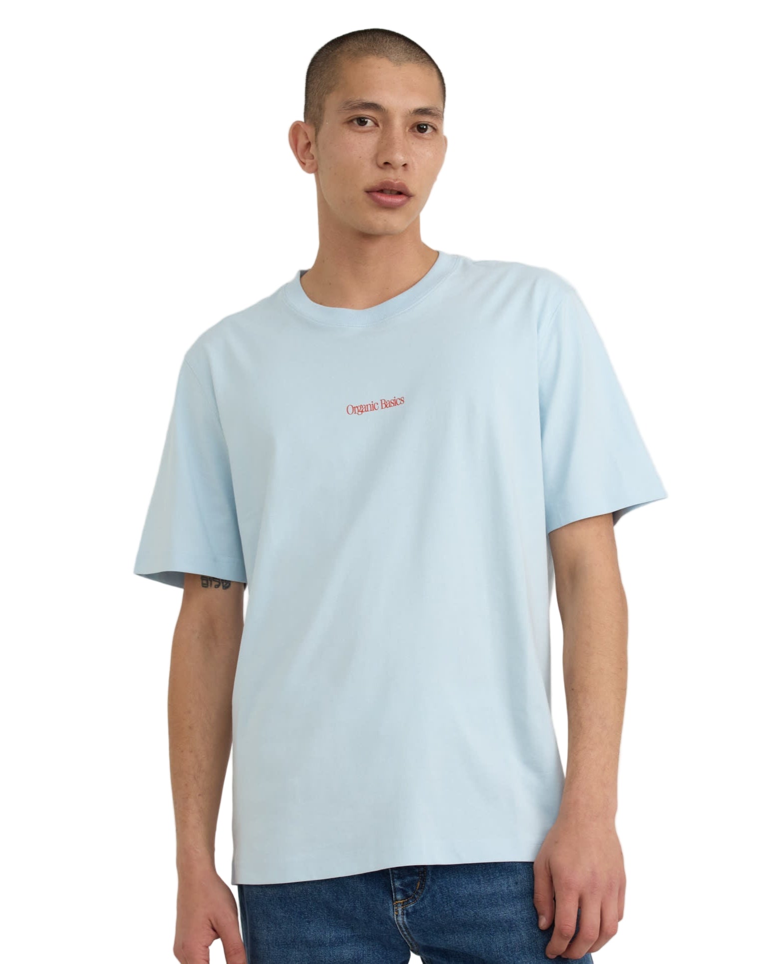เสื้อยืด True Logo Tee สี Light Blue ทรงบ็อกซี่ แขนสั้น คอกลม ทำจากผ้าฝ้ายออร์แกนิก 100% เนื้อหนา 210 gsm พร้อมโลโก้ Organic Basics ที่ด้านหน้า – True Logo Tee in Light Blue, boxy crewneck short-sleeve T-shirt made from 100% heavyweight organic cotton with Organic Basics logo – sold by Old Pine Trees
