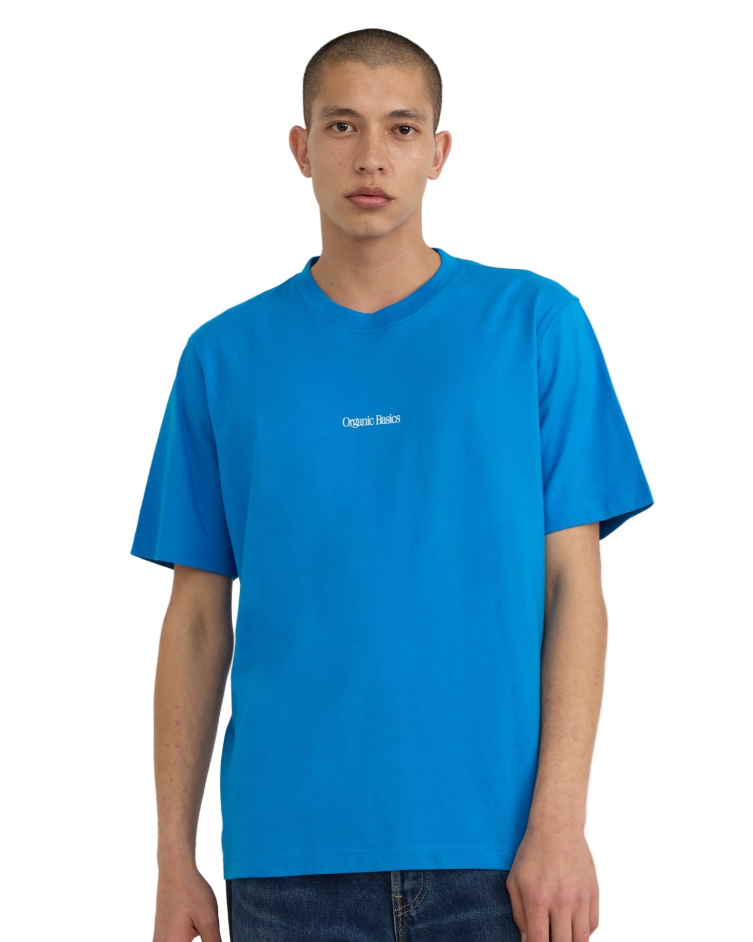 เสื้อยืด True Logo Tee สี Azure Blue ทรงบ็อกซี่ แขนสั้น คอกลม ทำจากผ้าฝ้ายออร์แกนิก 100% เนื้อหนา 210 gsm พร้อมโลโก้ Organic Basics ที่ด้านหน้า – True Logo Tee in Azure Blue, boxy crewneck short-sleeve T-shirt made from 100% heavyweight organic cotton with Organic Basics logo – sold by Old Pine Trees